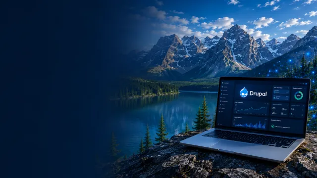 Laptop displaying a Drupal dashboard beside a mountain lake